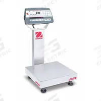 OHAUS Industrial Bench Scale: 12 in x 12 in, Not IP Rated, Column-Mounted, Defender 5000 (MPN 30461631). Key specifications — Connection Ports: USB; Readability: 0.002 lb/1 g; Brand: OHAUS; Weighing Surface Material: Stainless Steel.