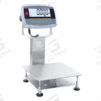 OHAUS Industrial Bench Scale: 11 3/4 in x 11 3/4 in, IP68/IP69K, Column-Mounted, Stainless Steel (MPN D61PW12K1R6). Key specifications — Connection Ports: Infrared Communication Kit; Readability: 0.002 lb/1 g; Brand: OHAUS; Weighing Surface Material: Stainless Steel.