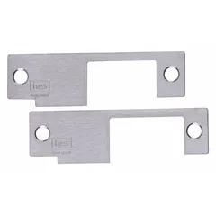This electric strike faceplate is a replacement component for HES Series 8500 strikes. It measures 1 1/4 inches wide by 4 7/8 inches high. Used in access control systems for commercial and industrial doors.