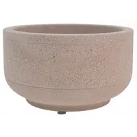 This round concrete bollard combines vehicle barrier and planter functions in a single unit. With a beige finish and 17-inch overall height, it is suited for use in commercial landscapes, parking lots, and pedestrian zones to prevent vehicle intrusion while accommodating plantings