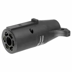 This plastic adapter converts a 7-way blade trailer plug to a 6-way round vehicle socket. It measures 4 inches overall length and 1-3/4 inches in height. Used to connect trailers with different wiring configurations for lighting and brake signals.