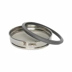 This air jet test sieve features a stainless steel frame and screen material with a US Standard Screen Size of 1.6 micron. It has an outside diameter of 7 7/8 inches and a height of 1 5/8 inches. Used for particle size analysis of fine powders in laboratory sieving applications.