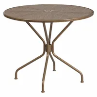 Round top patio table with gold metal frame and gold metal tabletop. Overall height 28 3/4 in, overall diameter 35 1/4 in. Suitable for outdoor dining, entertaining, or as a bistro accent on decks, patios, or balconies