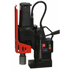 Standard magnetic drill press with electric magnet for ferrous surface attachment. Operates at 120V AC, 10 A current, with 6 in drill travel. Suitable for drilling and annular cutting in metal fabrication and structural steelwork.