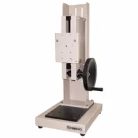 The SHIMPO FGS-200W is a hand wheel operated test stand designed for use with FGE, FGV, and MF Series force gauges. It provides manual vertical positioning for tension and compression testing in quality control and material testing applications