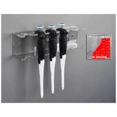 Wall-mounted pipette holder made of clear PETG for easy visibility. Holds up to six pipettes. Overall dimensions: 12 5/8 in width, 3 3/4 in height, 2 1/2 in length. Suitable for organizing pipettes in laboratory or industrial workspaces.