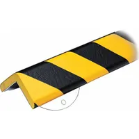 Flat-shaped corner protector made of polyurethane foam, colored yellow with black/yellow accents. Measures 39 inches in length and 0.5 inches in thickness. Mounts using anchor screws. Used to protect walls and equipment edges from impact in industrial facilities, warehouses, and loading docks