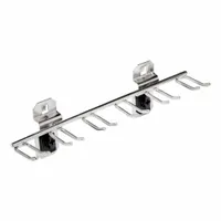 This pronged toolholder is designed for organizing writing instruments on square-hole pegboard. Made of brushed stainless steel with a silver finish, it features one hook with a 1 1/2 in depth and includes ABS retainers to secure tools. Surface-mount installation