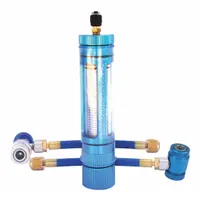 Universal 5-piece A/C oil and dye injector for R-134A systems. Includes hose. Size: 9 in x 2 in. Compatible with vehicles from 1993 to present. Used to add oil and UV dye during A/C service