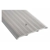 This 6 ft aluminum saddle threshold features a fluted transition type. It is installed at door openings to provide a low-profile transition between flooring surfaces and to help seal the gap beneath the door