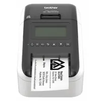 The BROTHER QL-820NWB is a direct thermal desktop printer from the Brother QL series, featuring cutter dispensing for individual label output. It prints at 1.84 in/sec and supports wireless (WiFi) communication. This printer is suited for on-demand label printing in shipping, inventory, and asset tracking applications