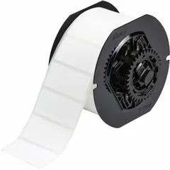 Thermal transfer precut label roll with rubber permanent adhesive and halogen-free material properties. Each roll contains 1,500 labels measuring 1 in x 2 in. Compatible with BBP33/i3300 printer series for on-demand identification and labeling in industrial environments.
