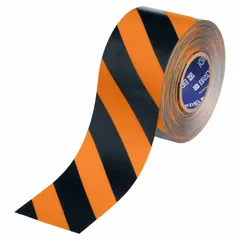 Black/orange striped floor marking tape with 22 mil thick polyester backing. Used to mark safety zones, hazard areas, and walkways in industrial facilities. The striped pattern signals caution in high-traffic areas.