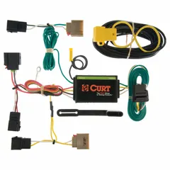 This 4-way flat connector is used to link trailer lighting systems to a towing vehicle. It provides electrical connections for brake, turn, and tail lights on utility trailers, boat trailers, and small campers. The plug is designed for standard automotive trailer wiring applications.
