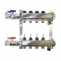 Stainless steel branch manifold with 1 1/4 in and 3/4 in ports, featuring 1 inlet and 1 outlet. Overall width 3.46 in. Used in hydronic heating and plumbing systems to distribute water or heating fluid from a supply line to branch circuits