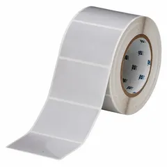 Gray polyester precut label roll measuring 2 in x 3 in, with 1,000 labels per roll. Compatible with THT printer series. Used for industrial identification, asset tracking, and cable marking in environments requiring chemical and abrasion resistance.