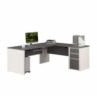 Laminate particle board L-shaped desk in Sandstone finish. Overall width 71 1/8 inches, overall depth 82 7/8 inches. Suitable for office workstations, providing corner or open-plan workspace for computer equipment and paperwork