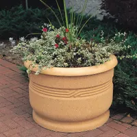 This round concrete bollard in beige finish is designed for perimeter security, traffic control, and landscape enhancement. With a 24 in overall height, it provides vehicle impact protection for buildings, walkways, and outdoor seating areas in commercial and municipal settings