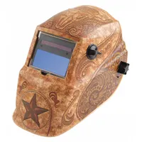 Auto-darkening welding helmet with a tan thermoplastic shell featuring a Lone Star graphic. Equipped with a digital ADF that adjusts from shade W9 to W13, two arc sensors, and a 3.82 x 1.73 in viewing area. Includes grind mode for material preparation and a ratchet suspension for secure fit. Suitable for arc welding, grinding, and cutting applications
