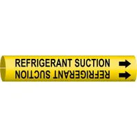 Snap-on pipe marker for identifying refrigerant suction lines. Yellow background with black legend and directional arrows. Fits pipe outer diameter from 3/4 to 1-3/8 inches. Single marker supplied