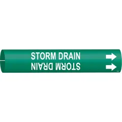 This snap-on pipe marker identifies storm drain piping. It features a green background with white legend and directional arrows. Designed for pipe outer diameters of 4 to 6 inches. The marker is installed without tools for quick identification in drainage systems.