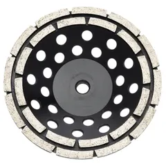 Double-row diamond segment cup grinding wheel with 7" diameter, 5/8"-11 threaded arbor, and 12 segments. Designed for heavy-duty surface preparation on concrete, stone, and masonry, including removal of coatings, adhesives, and uneven material. Part of the Vari-Grind G65 series.