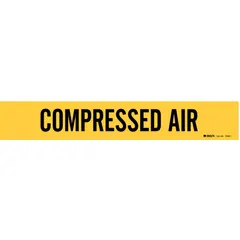 Yellow adhesive pipe marker with black legend reading 'Compressed Air'. Fits pipe outer diameters from 2-1/2 to 7-7/8 inches. Supplied without arrows. Used to identify compressed air lines in industrial piping systems.