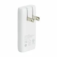 This wall charger converts 120V AC power to a single USB-C female output for charging compatible devices. It operates at 0.6A and 50/60Hz, housed in a white enclosure. Suitable for powering smartphones, tablets, and other USB-C devices in home, office, or commercial settings