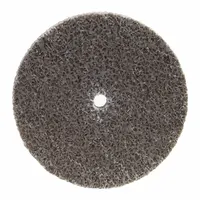 This NORTON Bear-Tex Rapid Blend NEX deburring wheel is 3 inches in diameter and 1/2 inch wide with a 1/4 inch arbor hole. It features a medium, hard aluminum oxide abrasive for deburring, blending, and finishing carbon steel and soft metals