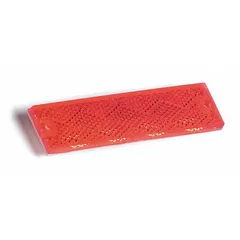 Red rectangular stick-on reflector made of acrylic. Measures 4 7/16 in overall length by 1 3/16 in overall width. Meets SAE A standards for reflectivity. Used for side or rear marking on trailers, trucks, and other vehicles to enhance visibility.