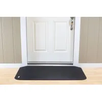 This black rubber ramp measures 46 inches in length and is ADA compliant. It provides a smooth transition over raised thresholds, door tracks, or low obstacles for wheelchairs, carts, and foot traffic in commercial and industrial settings