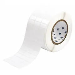 Precut label roll with tamper-indicating feature that leaves a VOID pattern upon removal. Measures 1/2 in x 1 in with a 1/2 in core, white gloss finish. Used for asset security and compliance in industrial environments, suitable for labeling equipment, components, or documentation where tamper detection is required.