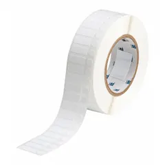 White nylon precut label roll measuring 3/8 in x 1 in, with 3000 labels per roll. Compatible with THT printer series and requires R4306 ribbon. Used for industrial labeling applications requiring durable nylon labels.