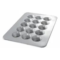 Muffin pan made of 26 ga gauge aluminized steel in a silver finish. Features 15 slots and an overall width of 17 7/8 inches. Suitable for baking muffins, cupcakes, and similar items in commercial or high-volume kitchen settings