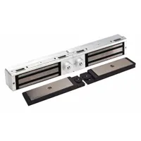 This DYNALOCK double-door magnetic lock from the 3101B Series is constructed of steel and features an instantaneous release delay. It measures 22 inches in length, 3 inches in width, and 2 3/4 inches in height. Designed for use in access control systems on pairs of doors in commercial and industrial settings