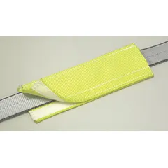 Protective wear pad for round and web slings. Made of yellow nylon, 3/16 inch thick, compatible with 1-inch wide slings. Used to reduce abrasion and cutting during lifting operations in material handling and rigging applications.