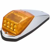 LED marker light with amber lens for surface mount installation via hole mount. Features wedge design and blunt cut wires for electrical connection. Used on commercial vehicles for side or roof marking to enhance visibility
