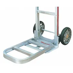 This folding nose plate extension adds a beveled platform to Magliner hand trucks, increasing the load-support area for bulky or oversized items. With a 300 lb capacity and 1 1/2-inch overall height, it improves load stability during transport in warehouses, delivery, and industrial settings.