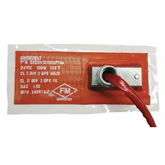 Silicone rubber heating blanket with adhesive backing for direct application to metal surfaces. Measures 12 x 12 inches with 3/16 inch thickness. Maximum operating temperature 232°C. Grounded and radiation resistant. Controller required for operation. Suitable for process heating, freeze protection, and temperature maintenance on pipes, tanks, and vessels.