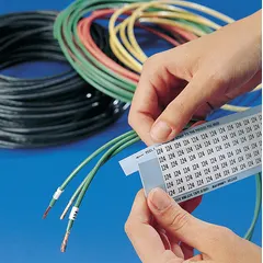 Preprinted wire marking label sheet with black-on-white vinyl labels. Includes 825 labels per pack with legends 1 to 33. Rated for temperatures from -40°F to 150°F. Used for identifying wires, cables, and terminals in electrical panels, control cabinets, and industrial machinery.