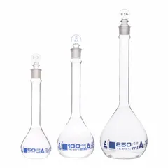 Set of three colorless round glass volumetric flasks with capacities of 50 mL, 100 mL, and 250 mL. Each flask has a tolerance of +/-5% and meets USP Type I specifications. Compatible with stopper size 16. Used for precise liquid measurement and mixing in laboratory settings.