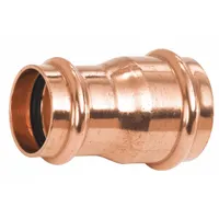 This NIBCO PC600-R coupling is a straight press-fit tube fitting made of copper. It joins 3 in CTS and 2 in CTS copper tubes with press-fit connections. Used in plumbing systems for water supply and hydronic heating applications