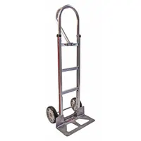 This single-loop hand truck features a silver aluminum frame and rubber tread-on-core wheels, offering corrosion resistance for damp or chemical-prone environments. Rated for 500 lb capacity, it is suitable for moving boxes, equipment, and materials in industrial, warehouse, and commercial settings