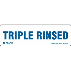 Paper label with white background, measuring 2 7/8 in x 7/8 in, printed with 'Triple Rinsed' message. Used to indicate containers that have been triple rinsed for compliance with DOT shipping requirements. Supplied in a 250-pack.