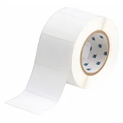 Gray metalized polyester precut label roll measuring 3 13/64 in x 2 in. Halogen-free material for industrial identification. Compatible with BBP12 printer series. Used for labeling equipment, cables, and components in facility management and manufacturing.