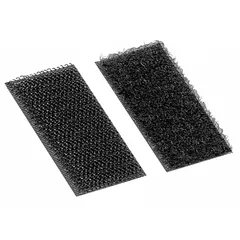 Pre-cut strip of hook-and-loop fastener with adhesive backing for temporary or permanent fastening. Made of nylon, black, 2 inches long by 1 inch wide. Suitable for cable management, mounting lightweight components, and securing panels without tools.
