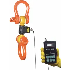 This dynamometer measures tension in suspended loads for material handling and rigging. It has a 10,000 lb capacity with 5 lb readability and +/-0.1% accuracy. The steel housing and corded remote indicator allow safe operation. Includes load cell, handheld wired remote, carrying case, manual, and calibration certificate.