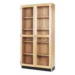 This tall cabinet provides secure storage for microscopes in laboratory and educational settings. Constructed with glass and oak, it allows visibility while protecting equipment from dust. Overall dimensions: 36 in width, 16 in depth, 7 ft height. No drawers included.