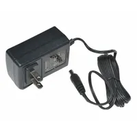AC adapter with NEMA 1-15 plug interface. Overall dimensions: 2 1/2 in height, 2 1/2 in width. Compatible with Versa Portion bench scale models RLP-6S, RLP-15S, and RLP-30S. Used to power industrial bench scales in material handling and weighing applications