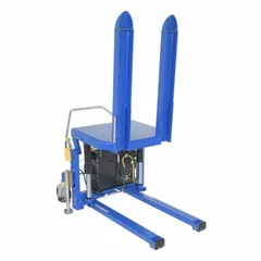 The VESTIL TM-20-DC is a powered-lift and manual-push container tilter with a 2,000 lb capacity. It features push-button lift control, standard forks measuring 38 inches in length by 26 inches in width, and a supported base. This unit is used in warehouses and manufacturing facilities to tilt containers, bins, or boxes for ergonomic access to contents, reducing bending and reaching.